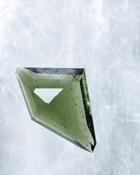 Transparent green fantasy cut Moldavite from Slavče, Czech Republic.