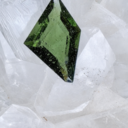 Transparent green fantasy cut Moldavite from Slavče, Czech Republic.
