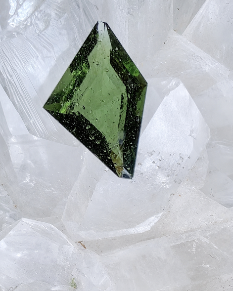 Transparent green fantasy cut Moldavite from Slavče, Czech Republic.