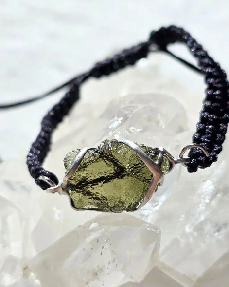 Moldavite bracelet with 1g transparent stone from Chlum on black braided cord