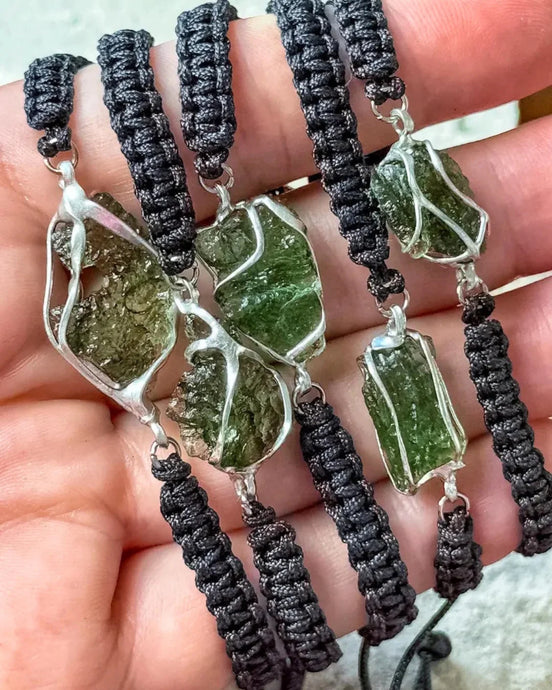 Moldavite bracelet worn on wrist, showing scale