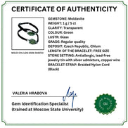 Certificate of Authenticity for a gemstone bracelet, featuring product details for a Moldavite bracelet with a black braided cord strap, signed by Valeria Hrabova and sealed with a Gem Identification Specialist stamp.