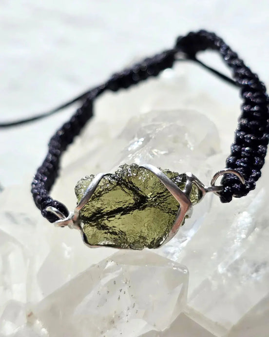 Moldavite bracelet with 1g transparent stone from Chlum on black braided cord