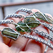 Moldavite bracelet with 0.8g transparent stone from Chlum on grey braided cord