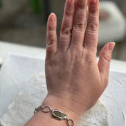 Moldavite bracelet with chunky oval-link chain and 0.8g Chlum stone