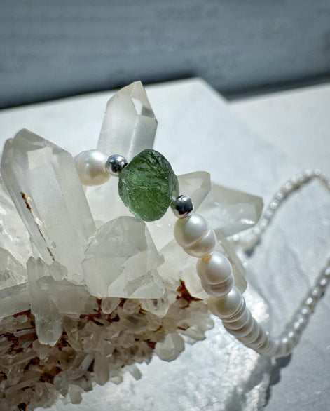 Natural drilled 0.4g Chlum Moldavite necklace with freshwater pearls and sterling silver.