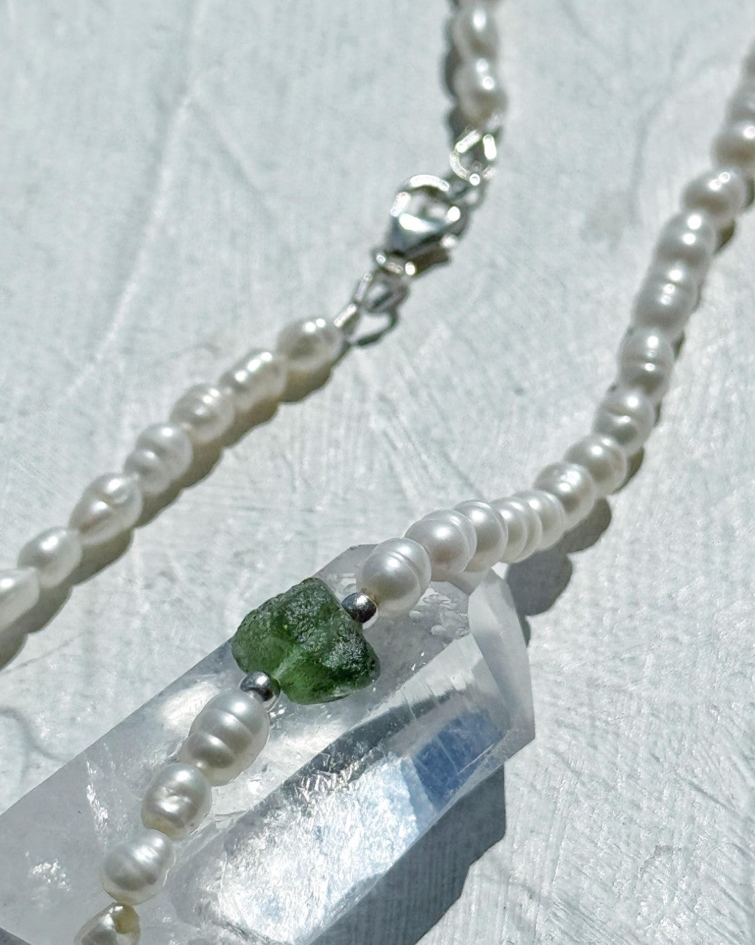 Natural drilled 0.4g Chlum Moldavite necklace with freshwater pearls and sterling silver.