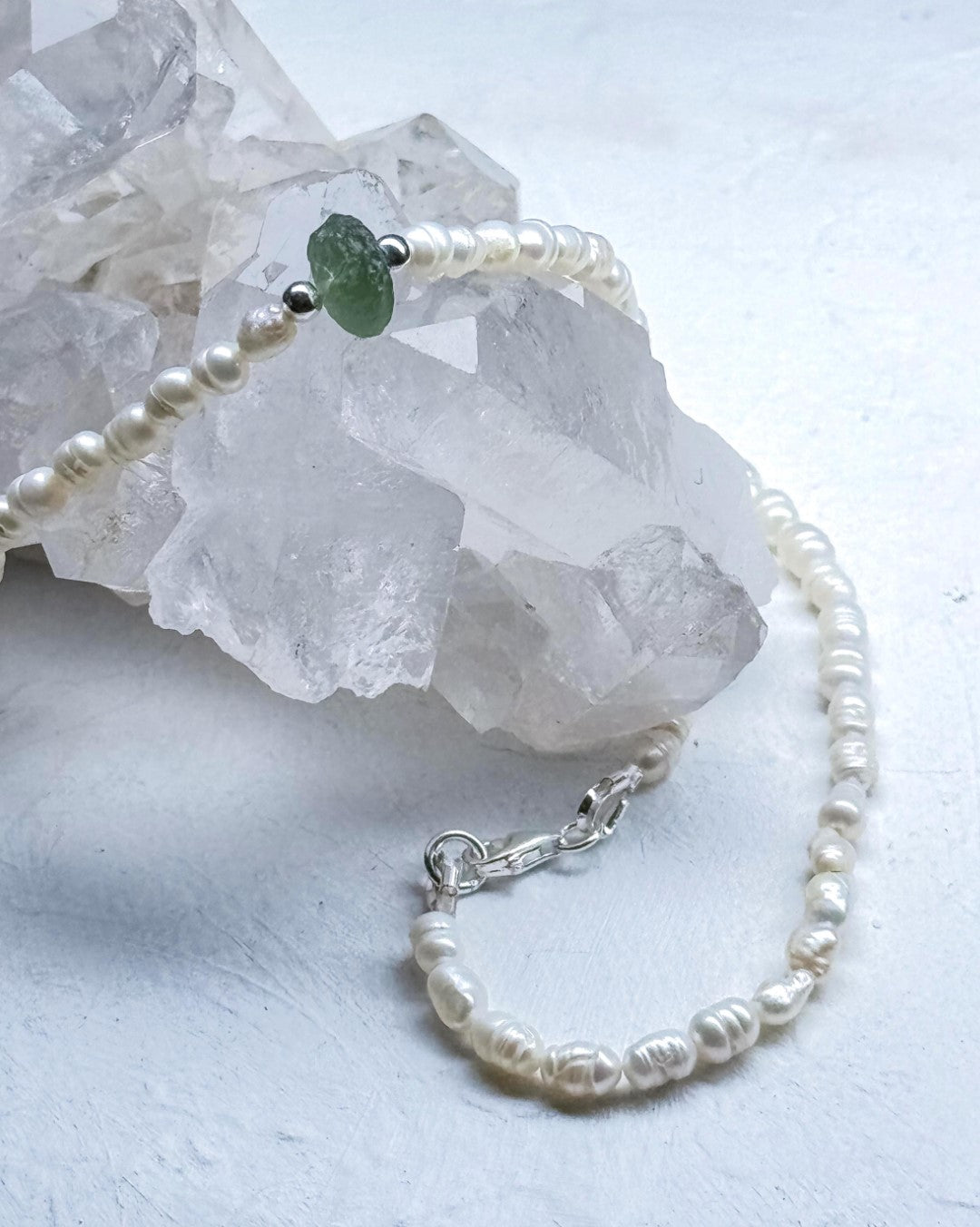 Natural drilled 0.4g Chlum Moldavite necklace with freshwater pearls and sterling silver.