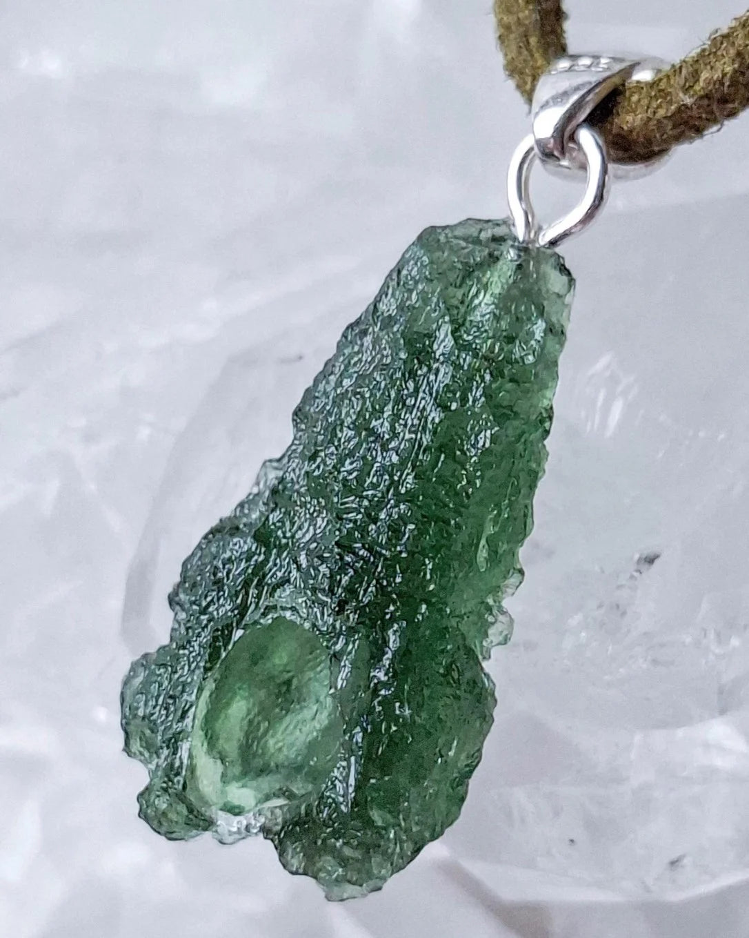 Raw 3.7g Moldavite pendant from Chlum with a sterling silver setting