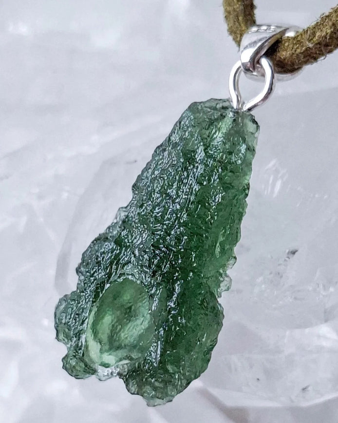 Raw 3.7g Moldavite pendant from Chlum with a sterling silver setting
