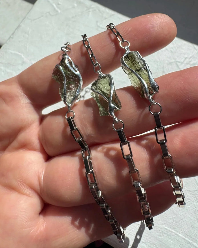 Transparent Chlum Moldavite bracelet with a square-link chain