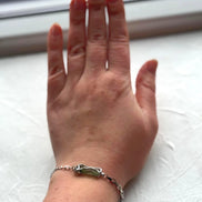Transparent Chlum Moldavite bracelet with a square-link chain   