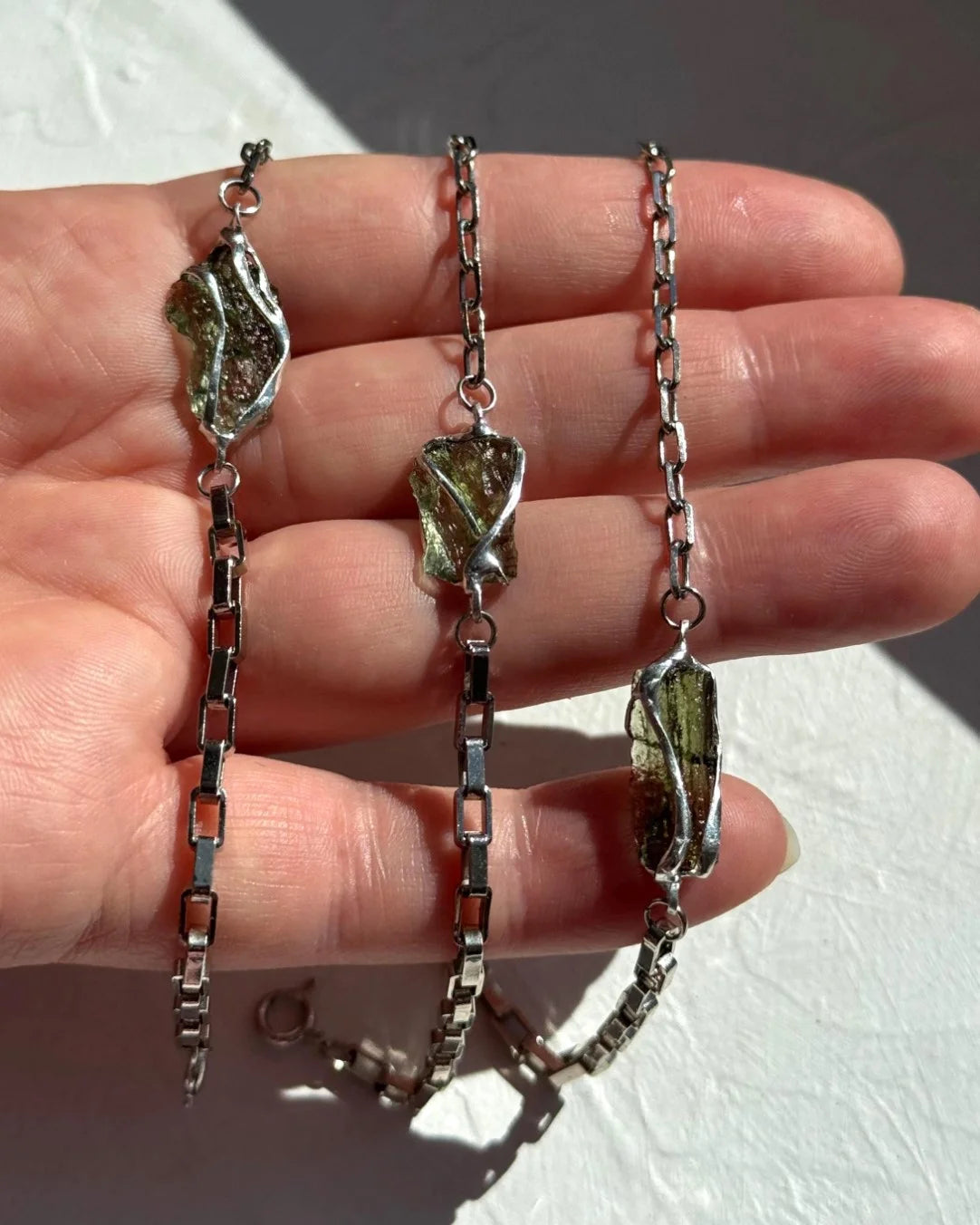 Transparent Chlum Moldavite bracelet with a square-link chain