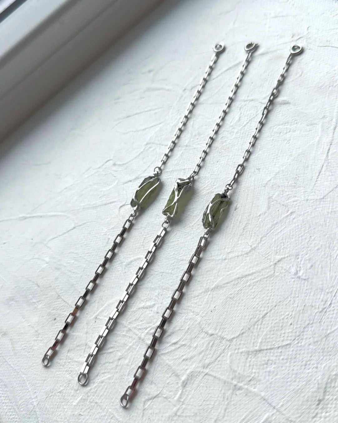 Transparent Chlum Moldavite bracelet with a square-link chain