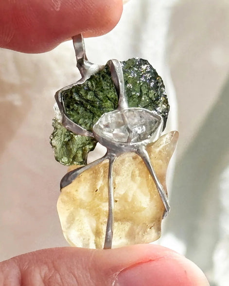 Pendant with a genuine 2.56 g natural Moldavite from Chlum, Czech Republic, Libyan Desert Glass and Herkimer diamond.