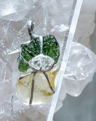 Pendant with a genuine 2.56 g natural Moldavite from Chlum, Czech Republic, Libyan Desert Glass and Herkimer diamond.
