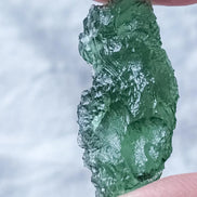 Transparent apple-green natural Moldavite weighing 3.84 g from Nesměň, Czech Republic