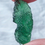 Transparent apple-green natural Moldavite weighing 3.84 g from Nesměň, Czech Republic