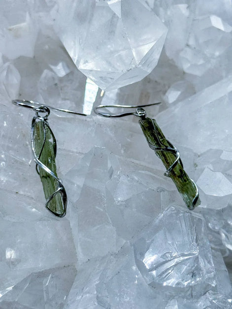 Raw Moldavite earrings with a 0.8 g pair of translucent green stones from Jankov, Czech Republic, in handcrafted open settings