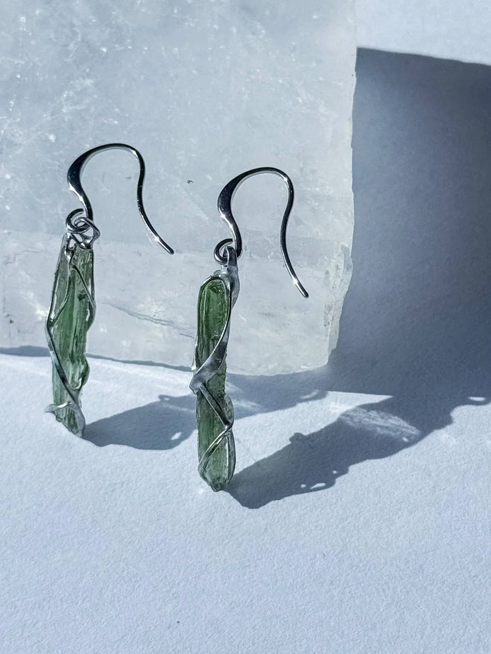 Raw Moldavite earrings with a 0.8 g pair of translucent green stones from Jankov, Czech Republic, in handcrafted open settings