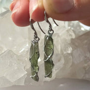 Raw Moldavite earrings with a 0.8 g pair of translucent green stones from Jankov, Czech Republic, in handcrafted open settings