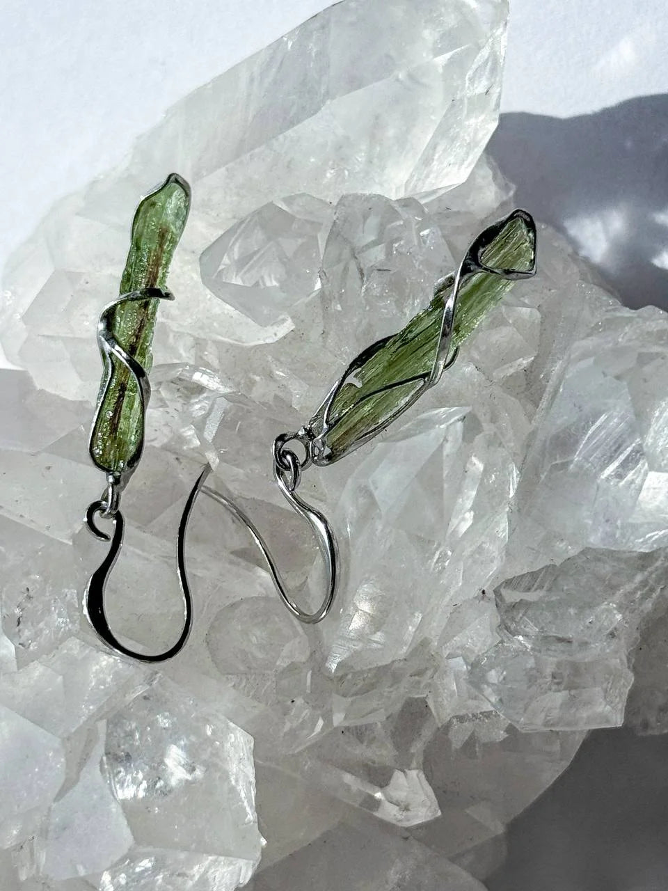 Raw Moldavite earrings with a 0.8 g pair of translucent green stones from Jankov, Czech Republic, in handcrafted open settings.