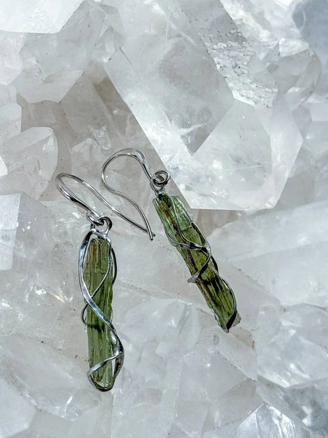 Raw Moldavite earrings with a 0.8 g pair of translucent green stones from Jankov, Czech Republic, in handcrafted open settings.