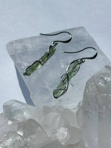 Raw Moldavite earrings with a 0.8 g pair of translucent green stones from Jankov, Czech Republic, in handcrafted open settings.