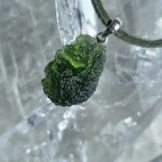Sterling silver pendant with 3.8 g transparent pure green Moldavite from Chlum, Czech Republic.