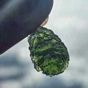 Sterling silver pendant with 3.8 g transparent pure green Moldavite from Chlum, Czech Republic.