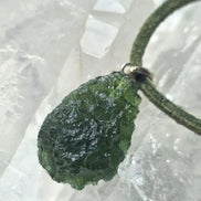 Sterling silver pendant with 3.8 g transparent pure green Moldavite from Chlum, Czech Republic.