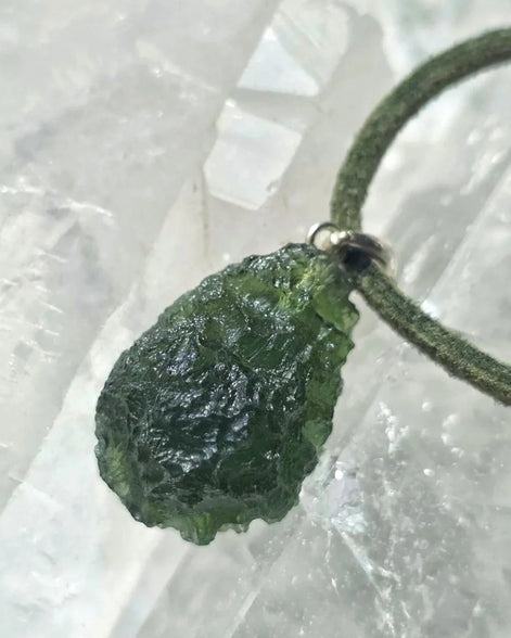 Sterling silver pendant with 3.8 g transparent pure green Moldavite from Chlum, Czech Republic.