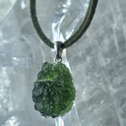 Sterling silver pendant with 3.8 g transparent pure green Moldavite from Chlum, Czech Republic.