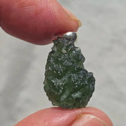 Sterling silver pendant with 3.8 g transparent pure green Moldavite from Chlum, Czech Republic.