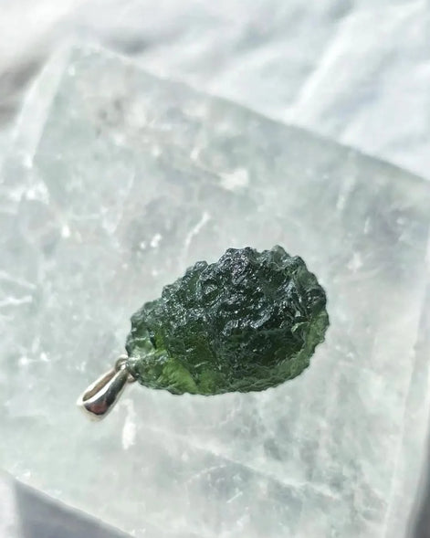 Sterling silver pendant with 3.8 g transparent pure green Moldavite from Chlum, Czech Republic.