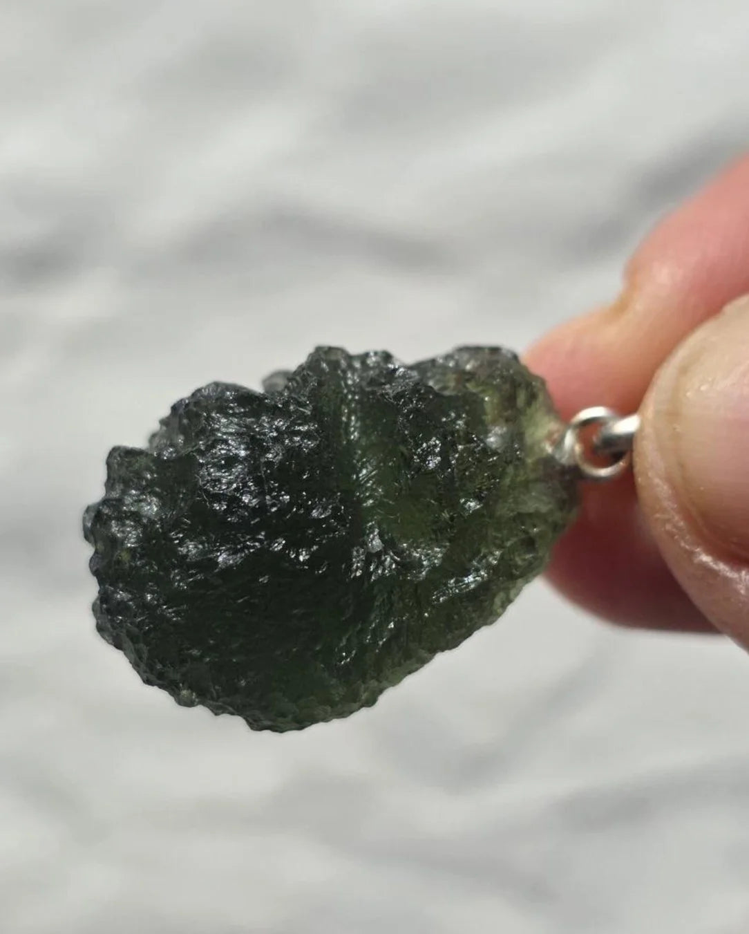 Sterling silver pendant with 3.8 g transparent pure green Moldavite from Chlum, Czech Republic.