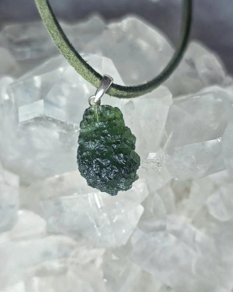 Sterling silver pendant with 3.8 g transparent pure green Moldavite from Chlum, Czech Republic.