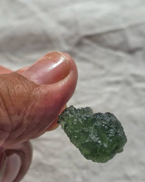 Sterling silver pendant with 3.8 g transparent pure green Moldavite from Chlum, Czech Republic.