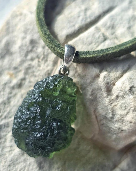 Sterling silver pendant with 3.8 g transparent pure green Moldavite from Chlum, Czech Republic.