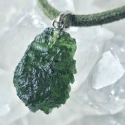 Sterling silver pendant with 3.8 g transparent pure green Moldavite from Chlum, Czech Republic.
