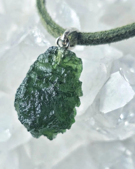 Sterling silver pendant with 3.8 g transparent pure green Moldavite from Chlum, Czech Republic.