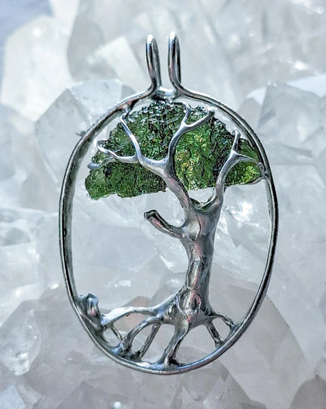 Genuine 2.32 g transparent green Moldavite tree pendant from Chlum, Czech Republic, handcrafted with copper and lead-free jewellery tin with silver admixture.
