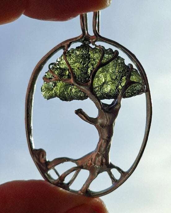 Genuine 2.32 g transparent green Moldavite tree pendant from Chlum, Czech Republic, handcrafted with copper and lead-free jewellery tin with silver admixture.