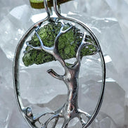 Genuine 2.32 g transparent green Moldavite tree pendant from Chlum, Czech Republic, handcrafted with copper and lead-free jewellery tin with silver admixture.