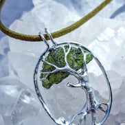 Genuine 2.32 g transparent green Moldavite tree pendant from Chlum, Czech Republic, handcrafted with copper and lead-free jewellery tin with silver admixture.