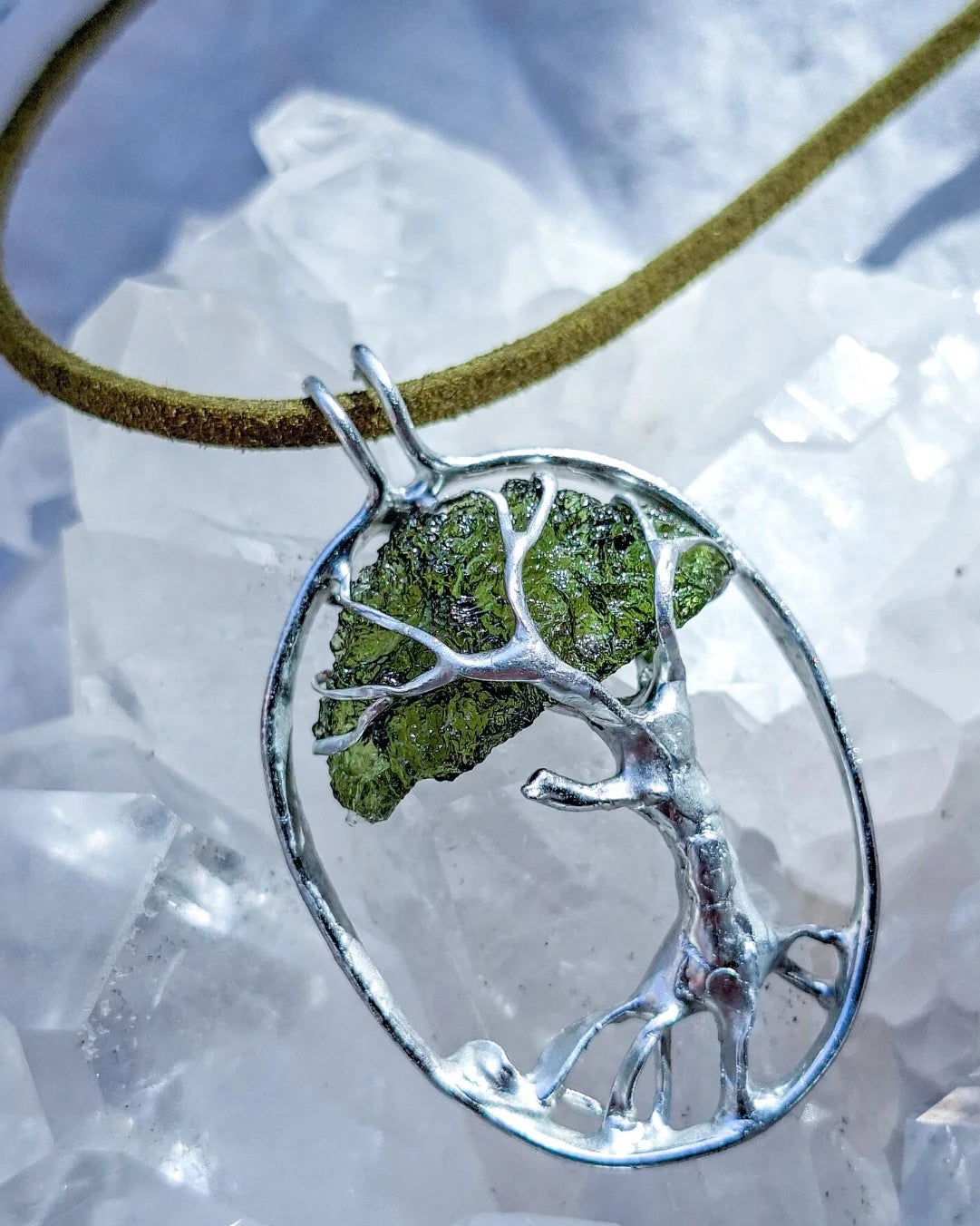 Genuine 2.32 g transparent green Moldavite tree pendant from Chlum, Czech Republic, handcrafted with copper and lead-free jewellery tin with silver admixture.