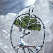 Genuine 2.32 g transparent green Moldavite tree pendant from Chlum, Czech Republic, handcrafted with copper and lead-free jewellery tin with silver admixture.