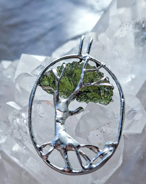 Genuine 2.32 g transparent green Moldavite tree pendant from Chlum, Czech Republic, handcrafted with copper and lead-free jewellery tin with silver admixture.