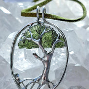 Genuine 2.32 g transparent green Moldavite tree pendant from Chlum, Czech Republic, handcrafted with copper and lead-free jewellery tin with silver admixture.
