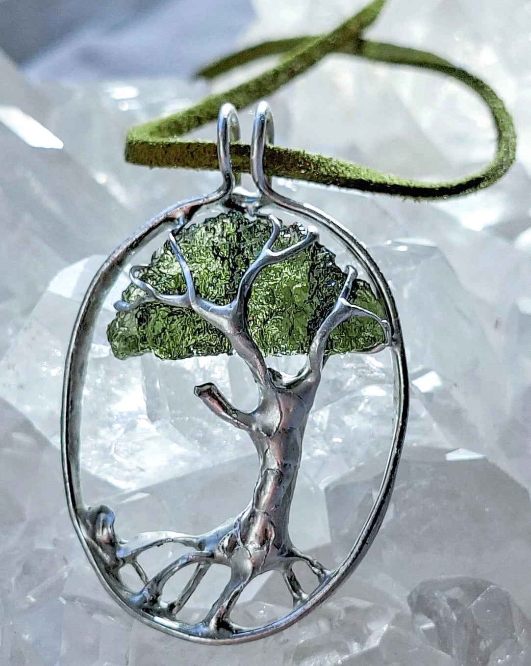 Genuine 2.32 g transparent green Moldavite tree pendant from Chlum, Czech Republic, handcrafted with copper and lead-free jewellery tin with silver admixture.